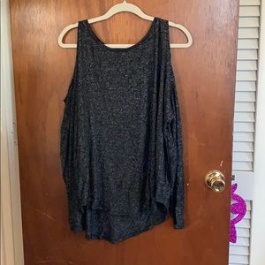 Open shoulder long sleeved top.